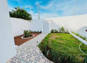 small villa with garden close to the beach